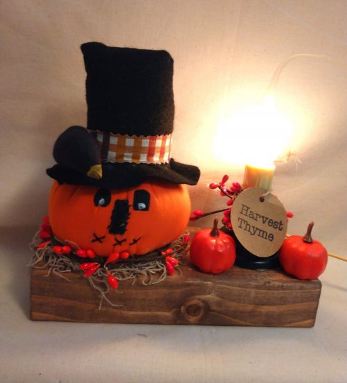 Lighted Pumpkin on Wood base